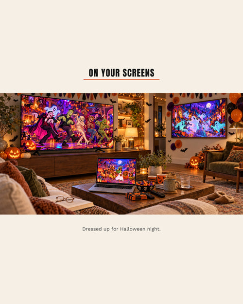 The same living room dressed for a Halloween party, bunting, bats, balloons and jack-o'-lanterns, with Dreamy Halloween Haze art on the TV, the framed screen and a laptop